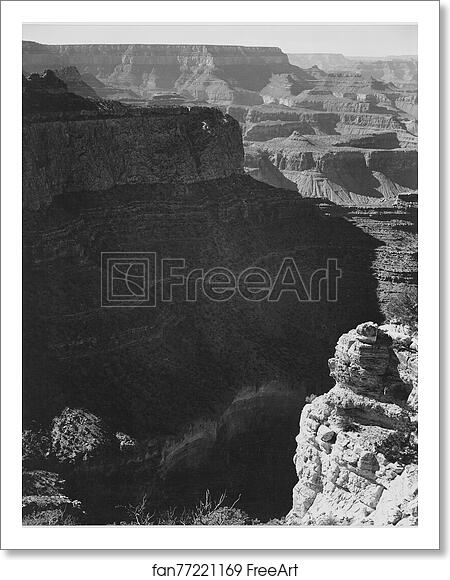 Free art print of View of darkly shadowed canyon at left and center, from the "South Rim, 1941, Grand Canyon National Park," Arizona. (vertical orientation).  Photographs of National Parks and Monuments, compiled 1941 - 1942, documenting the period ca. 1933 - 1942. by Ansel Adams (1902-1984)