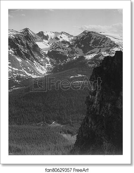 Free art print of View of snow-capped mountain timbered area below, "In Rocky Mountain National Park," Colorado. (Vertical Orientation).  Photographs of National Parks and Monuments, compiled 1941 - 1942, documenting the period ca. 1933 - 1942. by Ansel Adams (1902-1984)