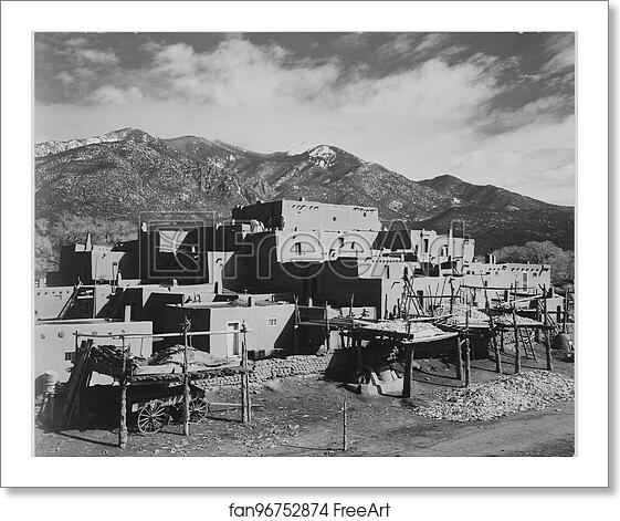 Free art print of Full view of city, mountains in background, "Taos Pueblo National Historic Landmark, New Mexico, 1941.".  Photographs of National Parks and Monuments, compiled 1941 - 1942, documenting the period ca. 1933 - 1942. by Ansel Adams (1902-1984)